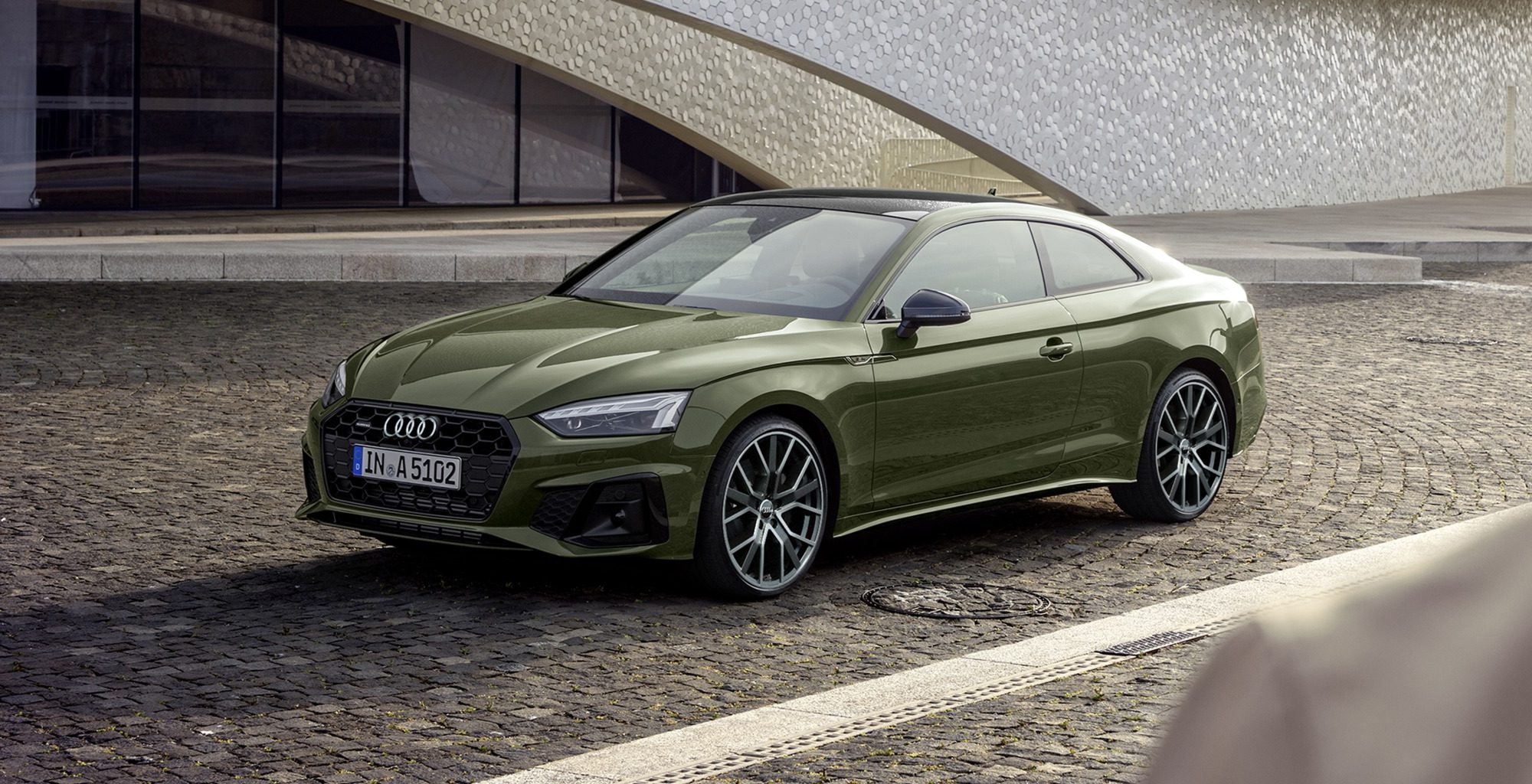 Olive Green Audi A5 Coupe in ubran setting